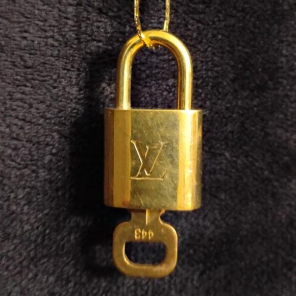 Louis Vuitton gold tone brass lock and key on 18" chain #443 - Picture 1 of 4
